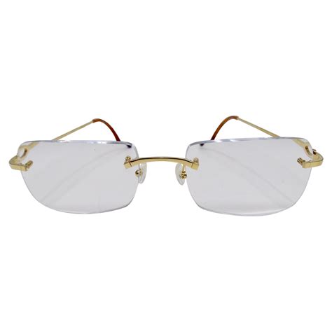 gold frame cartier glasses|cartier rectangular rimless glasses.